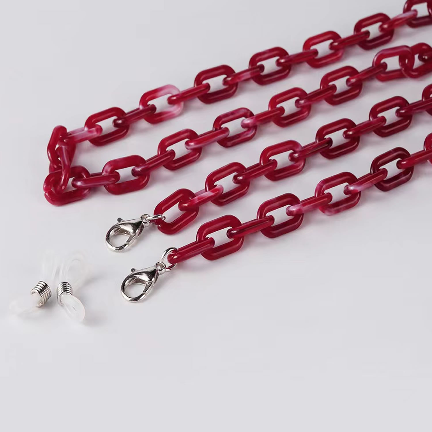 dark red resin glasses and mask necklace